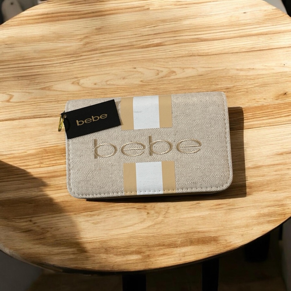 Bebe Beige and Gold Stripe Clutch